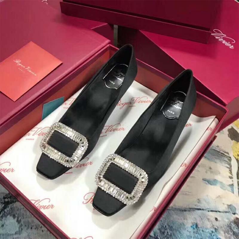 Top view showing square toe and silk satin texture on Roger Vivier pumps
