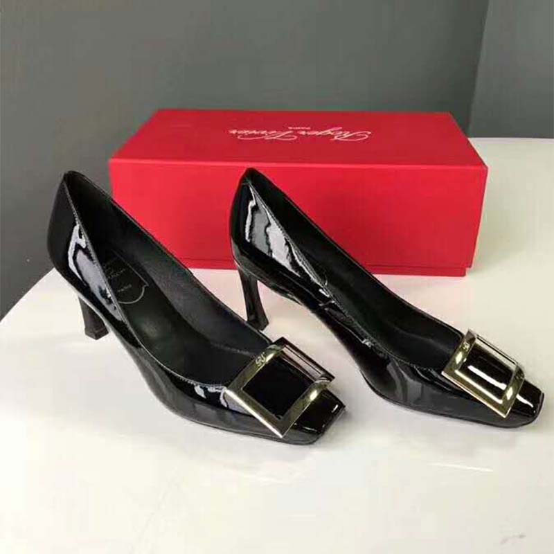 Top angle showing black patent leather and high-top silhouette shoes