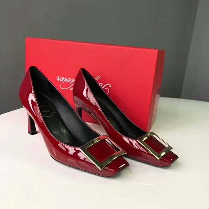 Side profile showing heel height of Roger Vivier Red Trompette Pumps