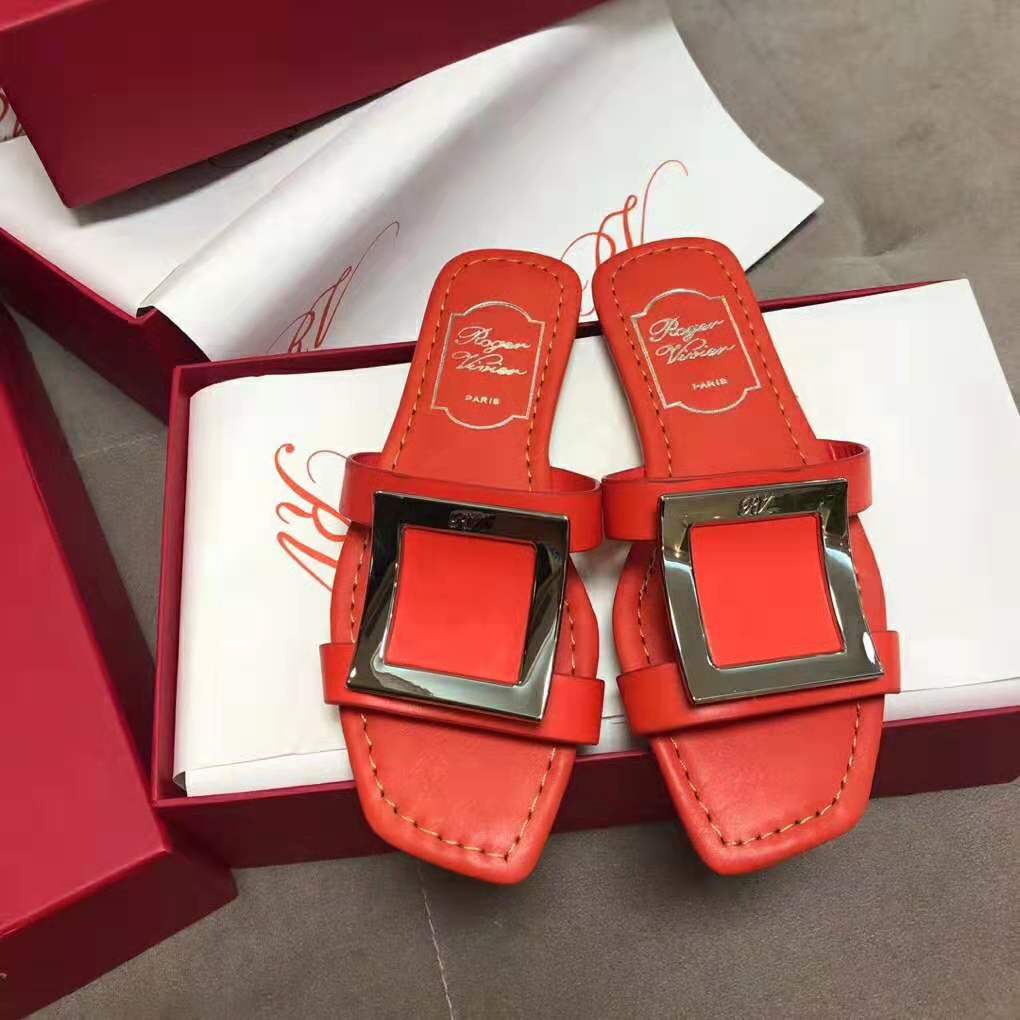 Close-up of silver-tone buckle on Roger Vivier Women Bikiviv’ Mules Flat Sandals-Orange
