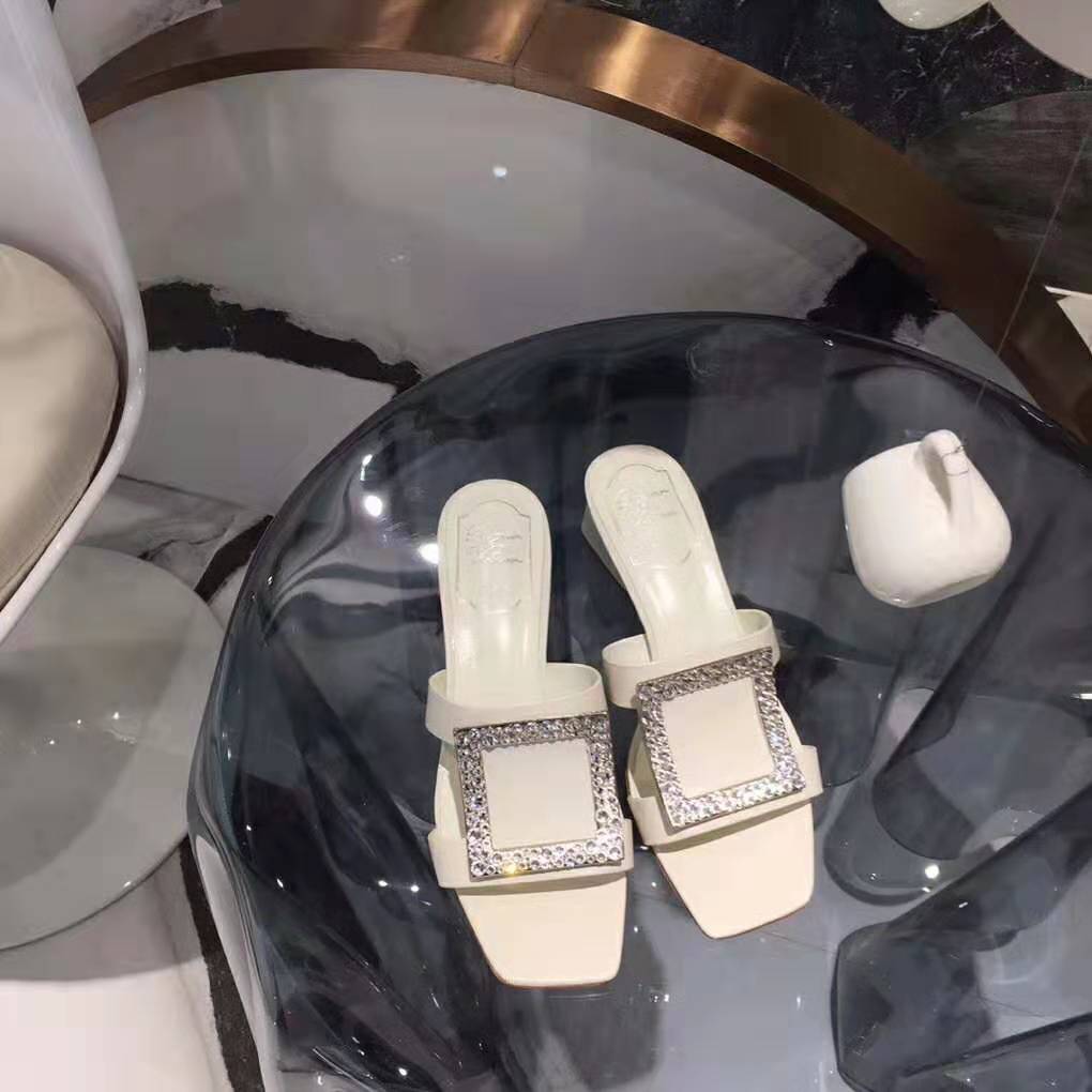 Close-up of strass buckle on Roger Vivier Women Bikiviv’ Strass Mules-White