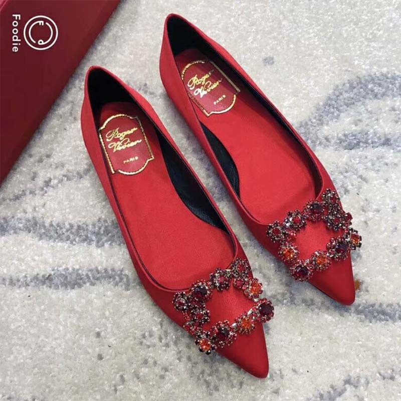 Overhead shot showing red silk satin and 5mm heel of Roger Vivier ballerinas