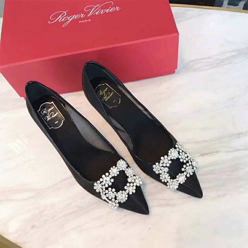 Top view highlighting black net material and sleek silhouette of Roger Vivier pumps