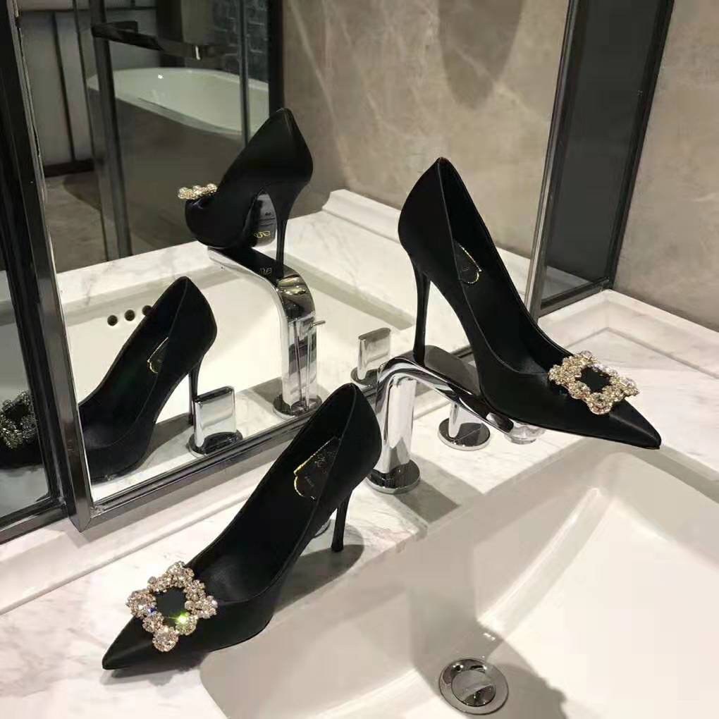 Top angle showing sleek pointed toe of Roger Vivier Flower Strass Buckle Pumps