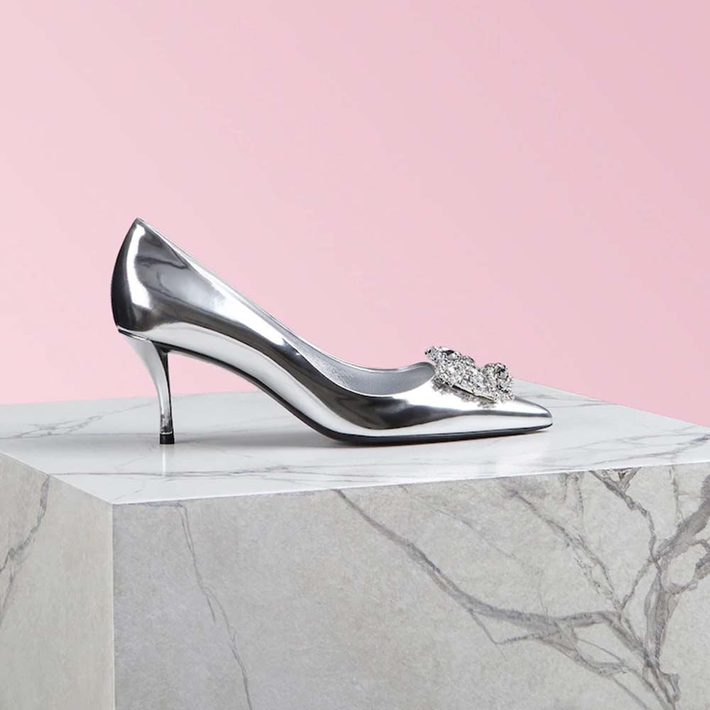Side view of Roger Vivier Women Flower Strass Buckle Pumps-Silver showing heel