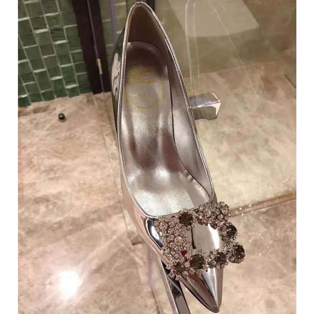 Top-down angle highlighting silver leather and buckle on Roger Vivier Women Flower Strass Buckle Pumps-Silver