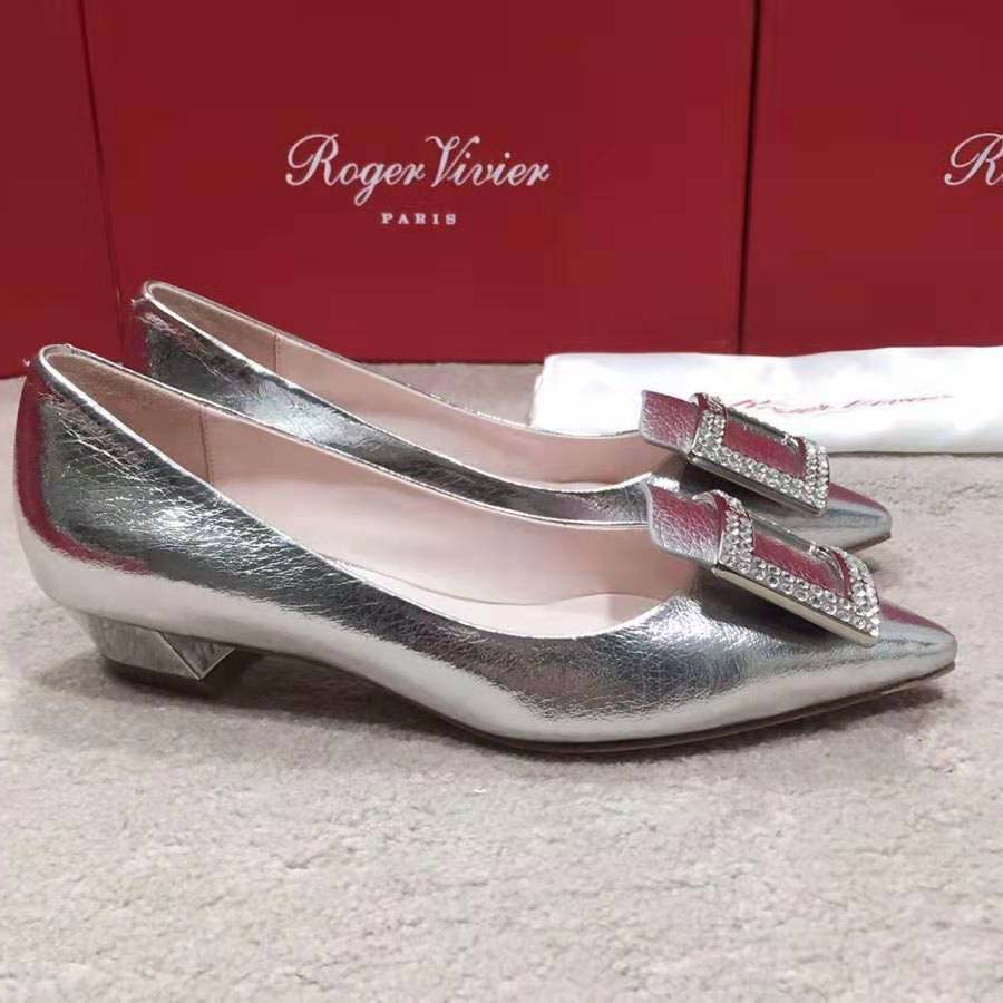 Close-up of crystal Gommettine buckle on Roger Vivier ballerinas