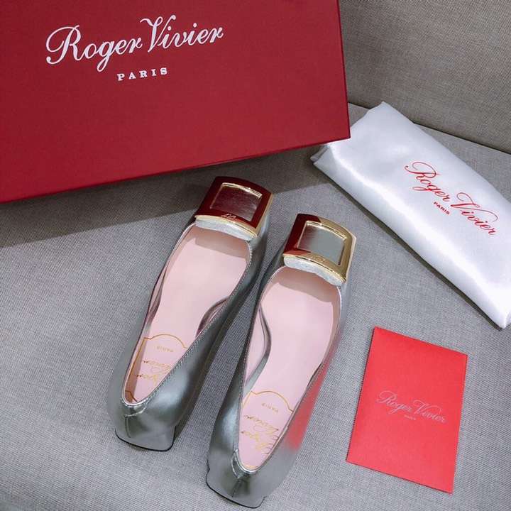 Close-up of silver buckle on Roger Vivier Metal Buckle Gommettine Ballerinas