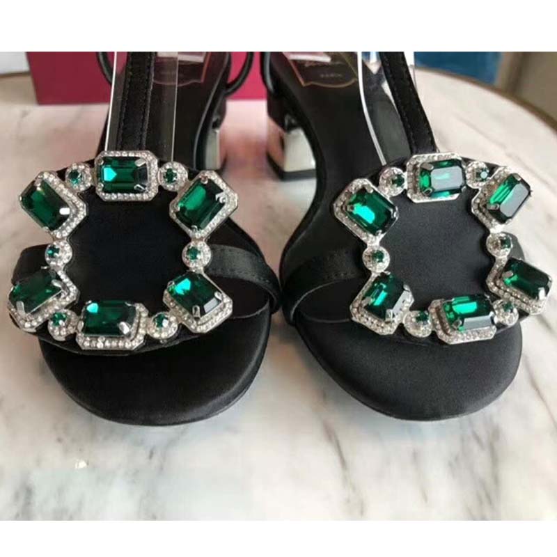 Close-up on crystal-embellished buckle of Roger Vivier Women Podium Crown Jewels Sandals