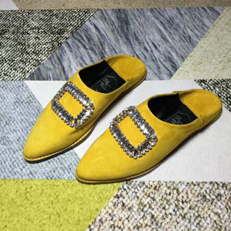 Close-up of sparkling strass buckle on Roger Vivier Bab’ Viv’ loafers