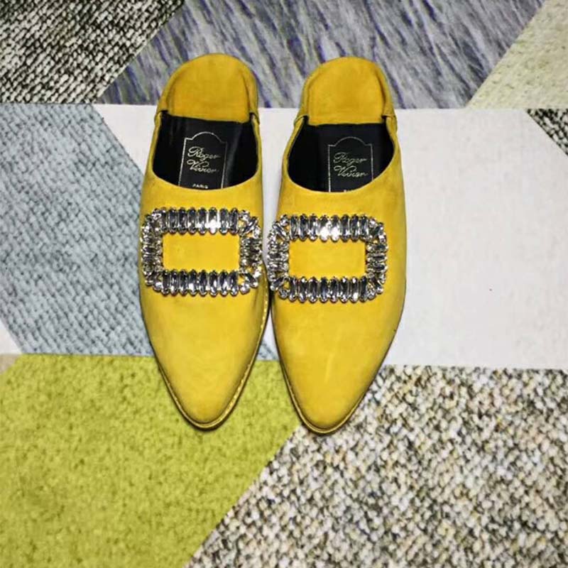 Top angle showing yellow leather and slip-on design, Roger Vivier Bab’ Viv’