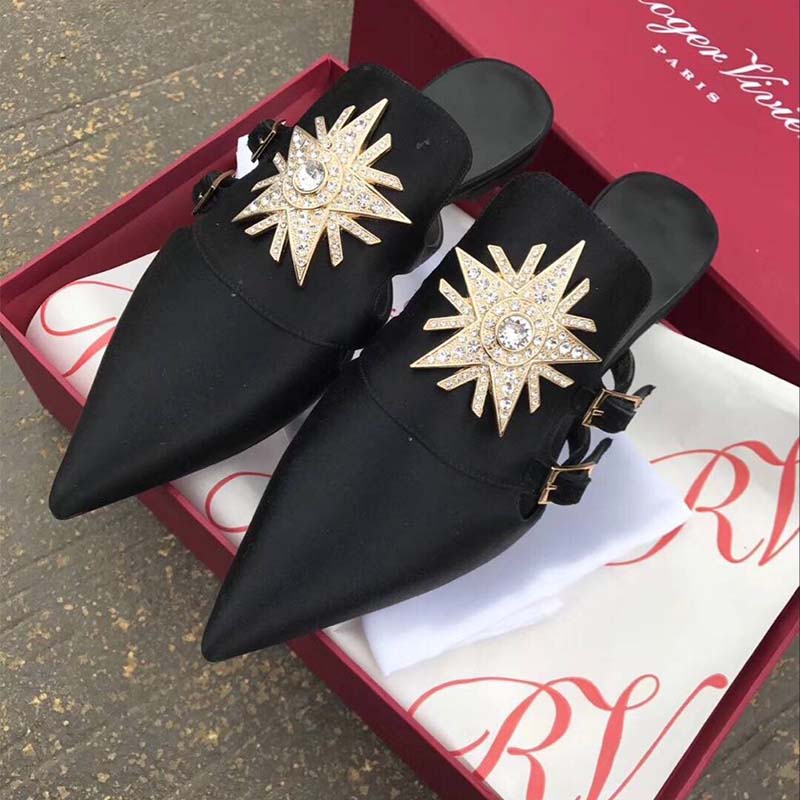 Close-up of star-shaped strass detail on Roger Vivier Velvet-Black mules