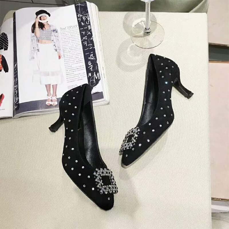 Angled shot highlighting heel height of Roger Vivier Women Shoes Vertigo Diadem Dots Pumps