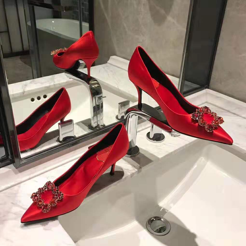 Top angle showing slip-on silhouette of Roger Vivier Silk Flower Strass Pumps