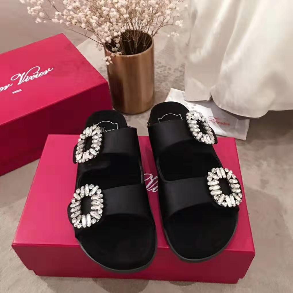 Top view showing black silk satin and slip-on design of Roger Vivier Slidy Viv’ sandals