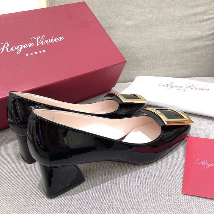 Close-up of the signature buckle on Roger Vivier Women Tres Vivier Ballerinas