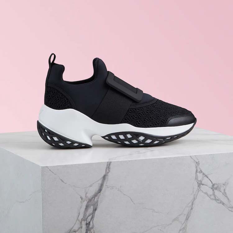 Side angle of Roger Vivier Women Viv’ Run Sneakers-Black showing buckle detail