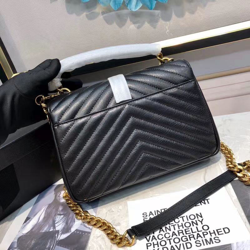 Side angle showing quilted matelassé leather texture of Saint Laurent YSL bag
