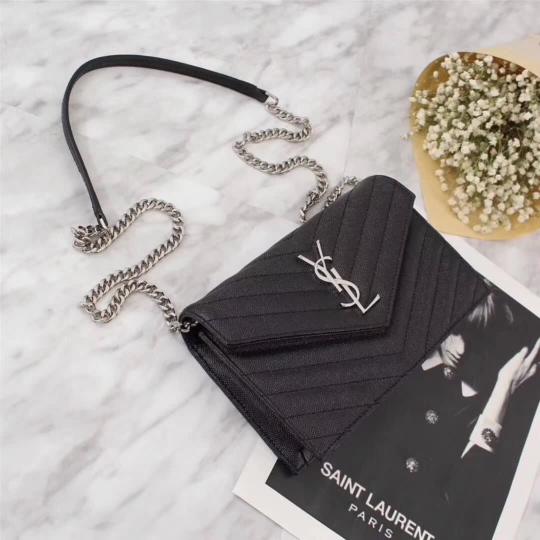 Side angle showing chain strap detail on Saint Laurent YSL Medium Monogram Wallet