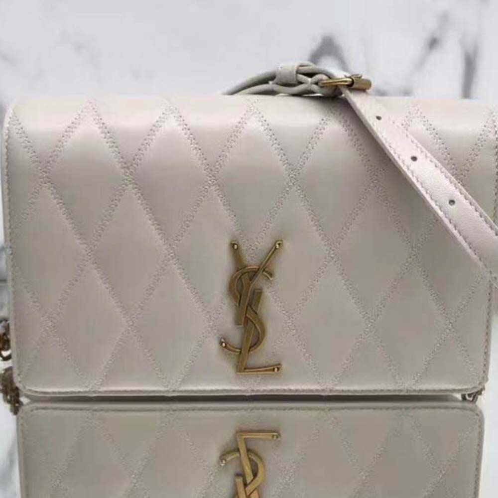 Close-up of diamond-quilted lambskin texture and gold YSL logo on Angie bag