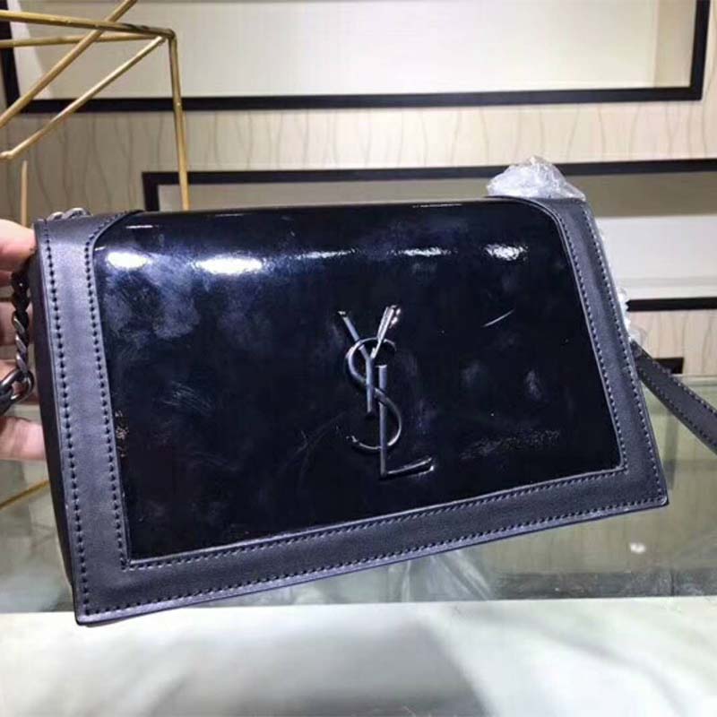 Close-up of gold YSL hardware on Saint Laurent YSL Women Book Bag