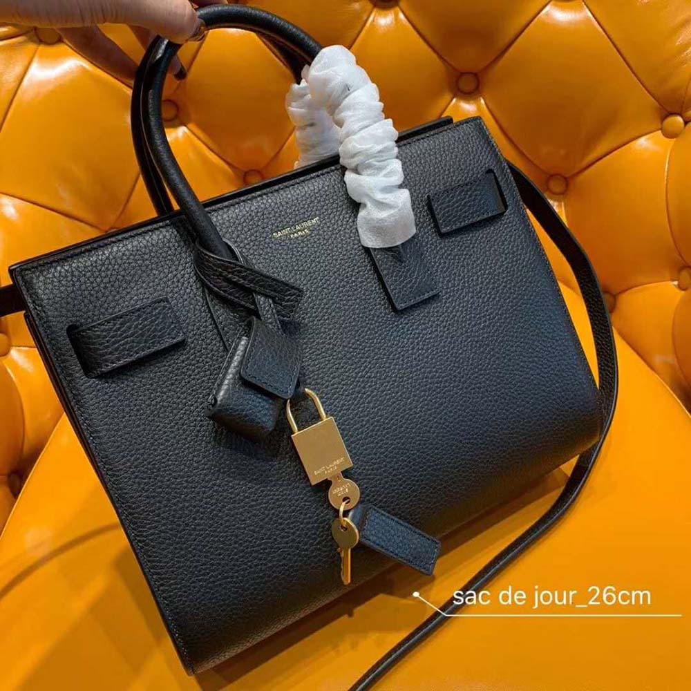 Side angle showing grained leather texture on Saint Laurent YSL Classic Sac De Jour Baby