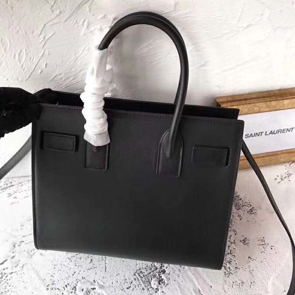 Side profile showcasing structured silhouette of Saint Laurent YSL Classic Sac De Jour Baby