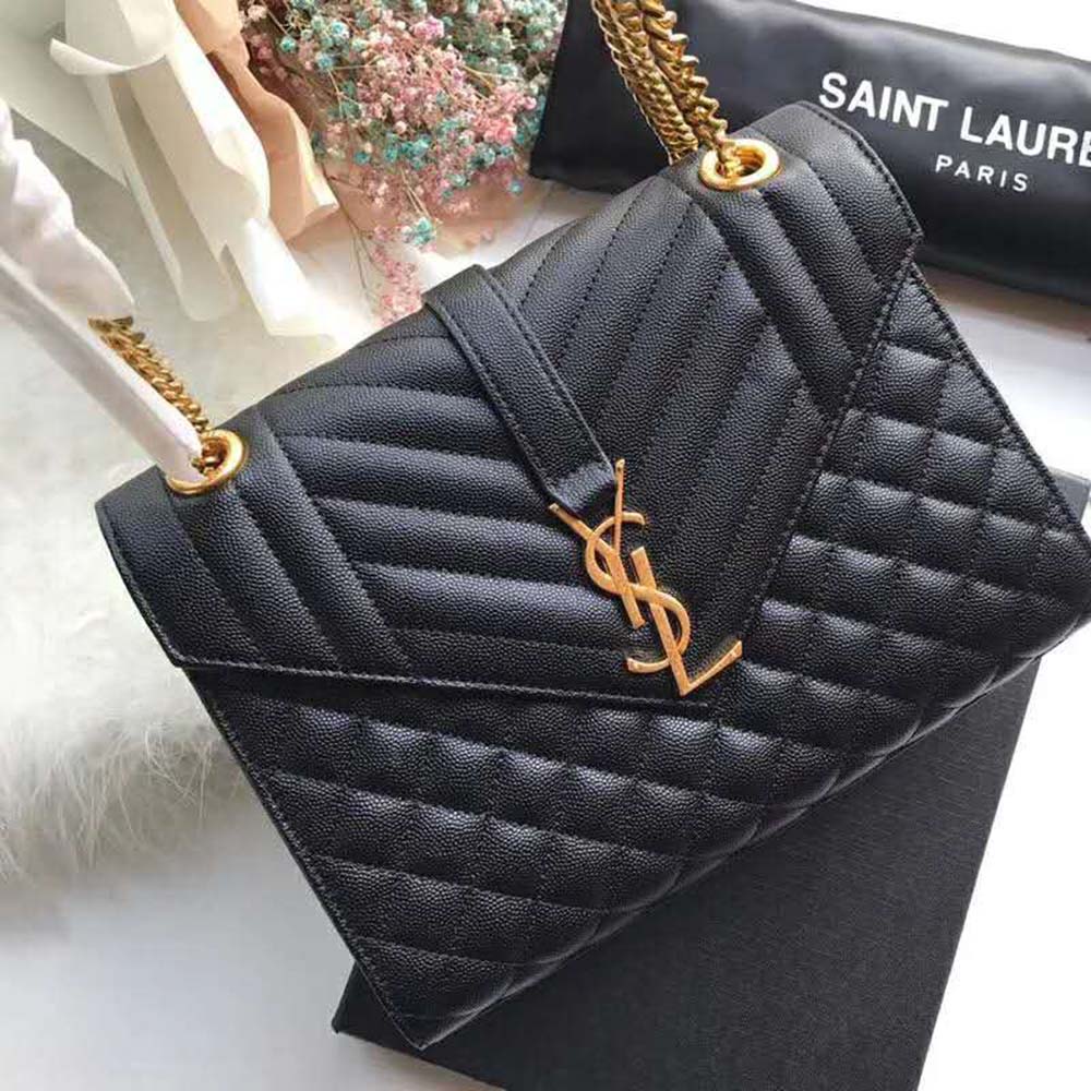 Close-up of YSL gold logo on Saint Laurent YSL Women Envelope Small Grain De Poudre Embossed