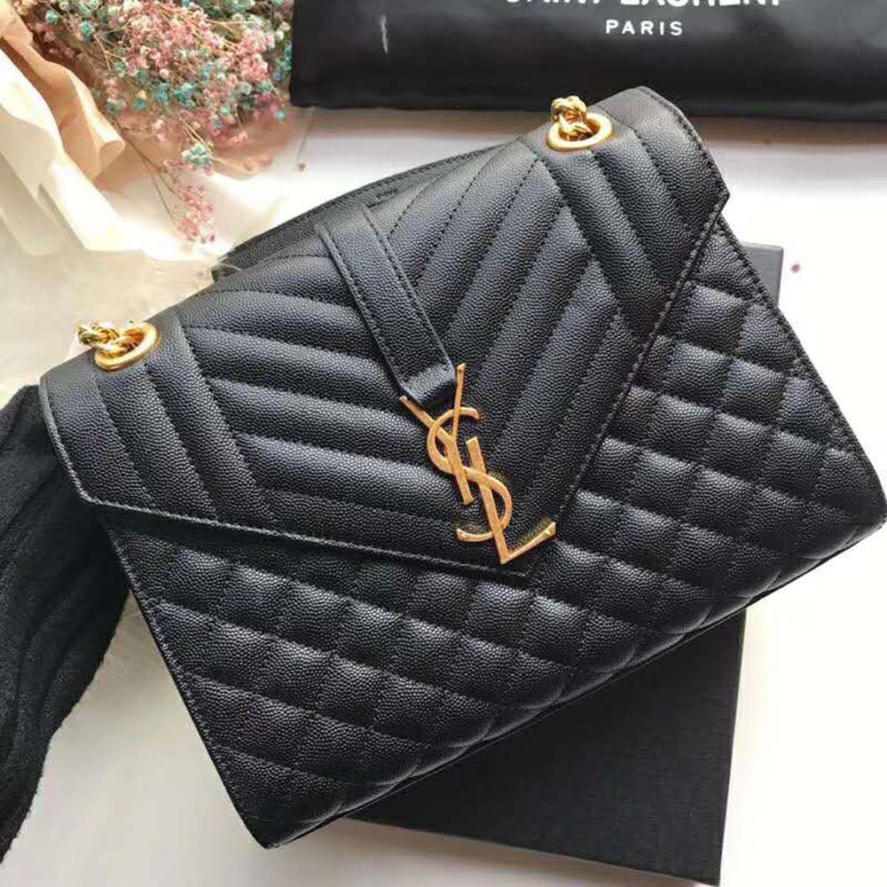 Side angle showing compact silhouette of Saint Laurent YSL Women Envelope Small Grain De Poudre Embossed