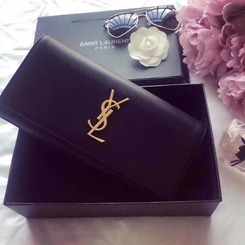 Close-up of gold YSL logo hardware on Saint Laurent YSL Women Kate Clutch