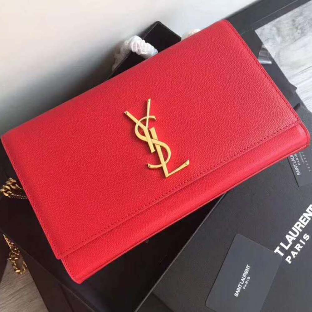 Close-up of gold YSL logo clasp on Kate Medium Grain De Poudre Embossed-Red