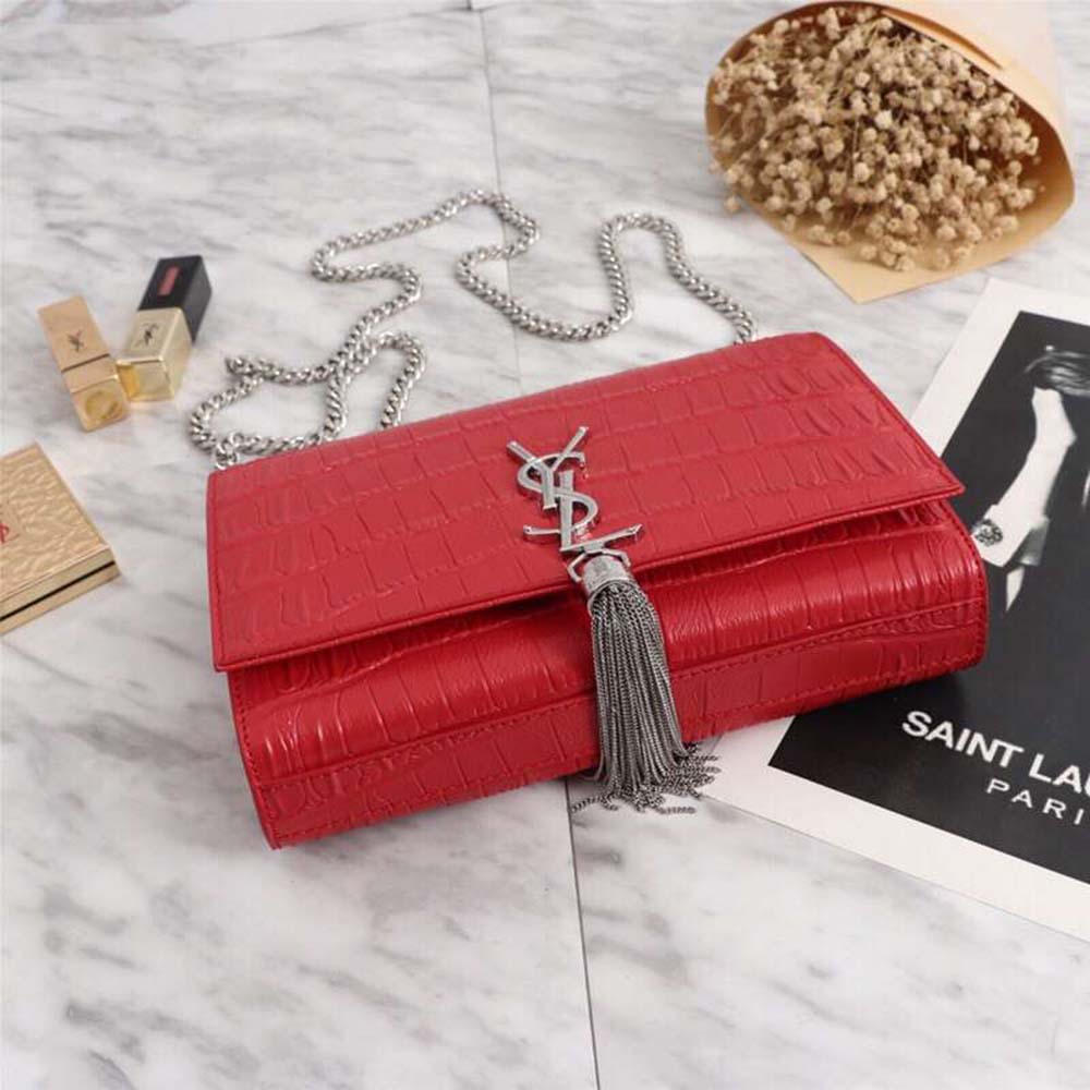 Side angle showing compact silhouette of Saint Laurent YSL Kate Small shoulder bag