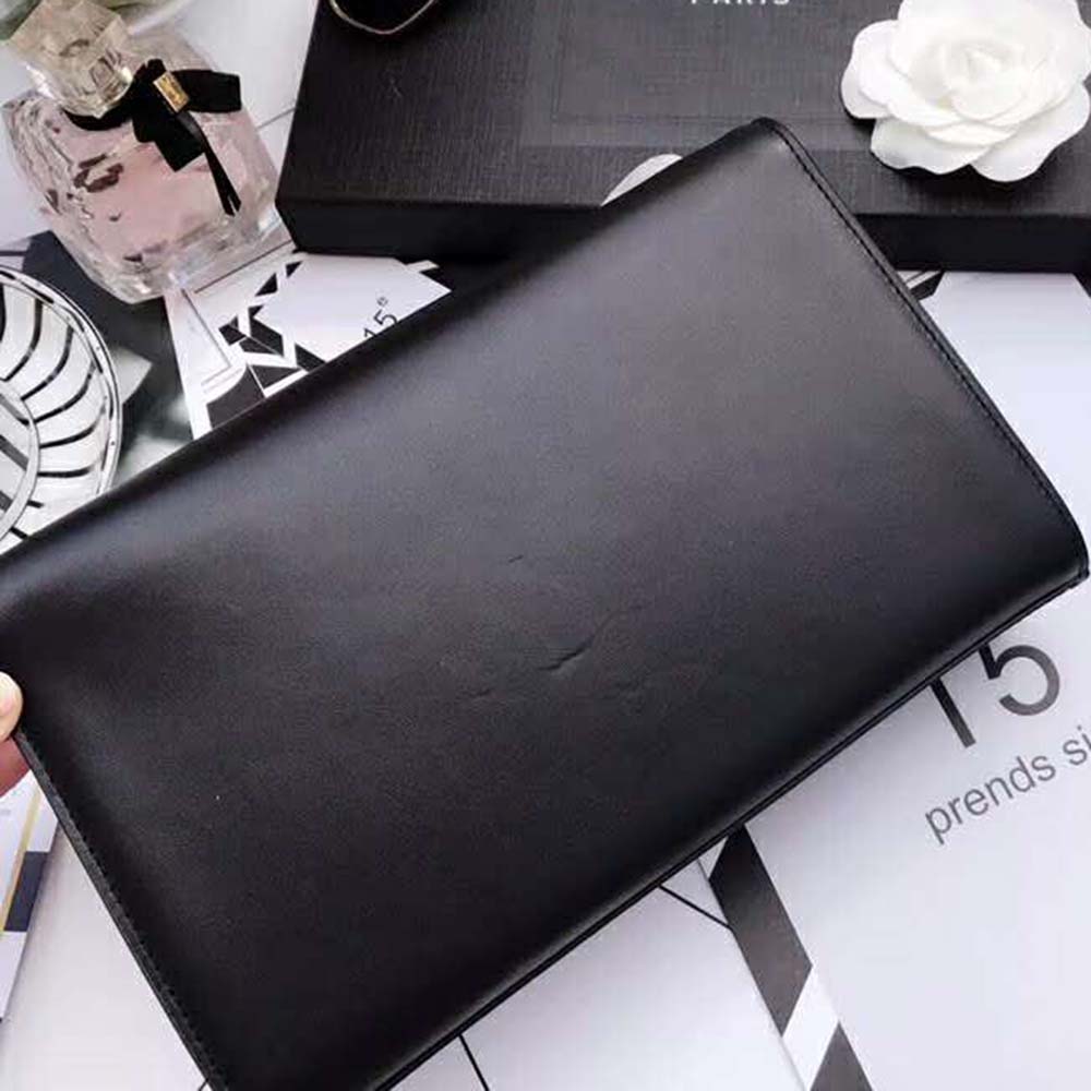 Side angle showing compact silhouette of Saint Laurent YSL Women Kate Small bag