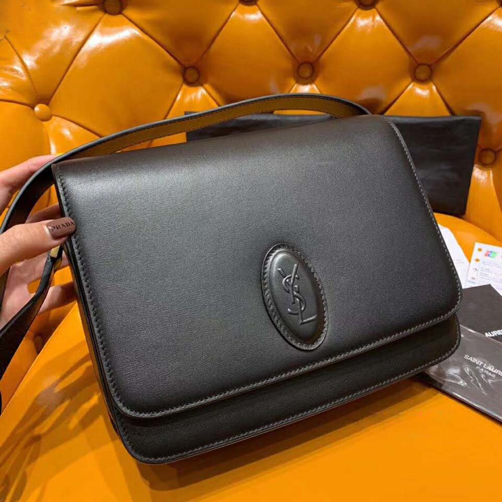 Side angle showing smooth black leather texture of Le 61 Saddle Bag