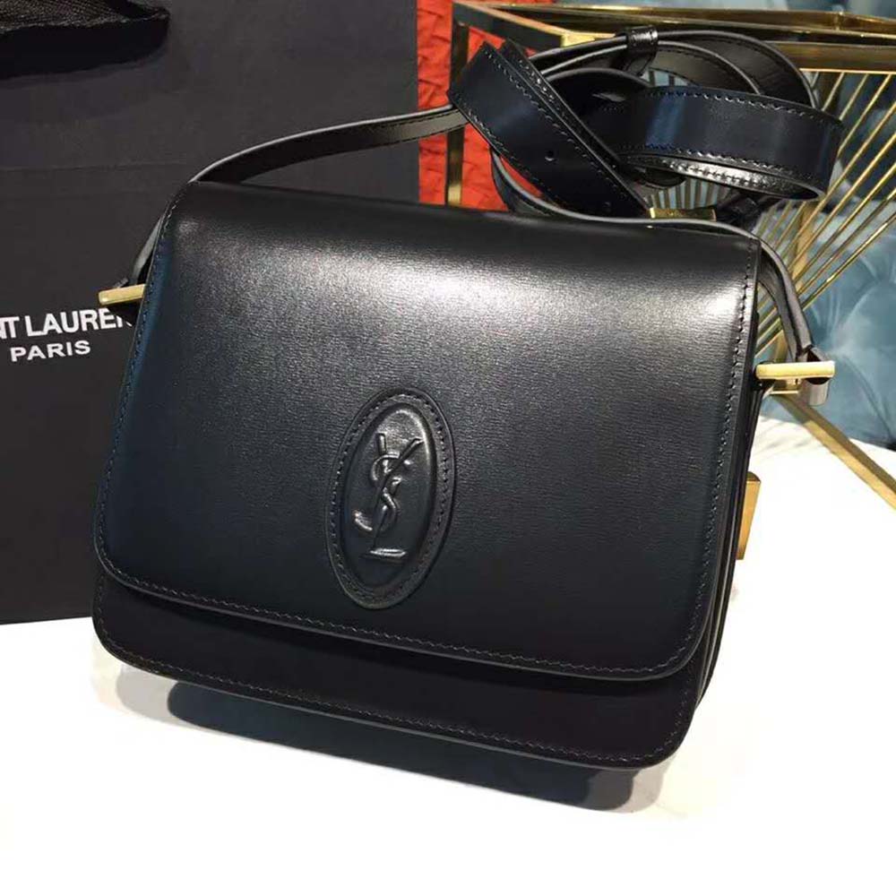 Close-up of gold YSL logo on Saint Laurent YSL Women Le 61 Small Saddle Bag Smooth