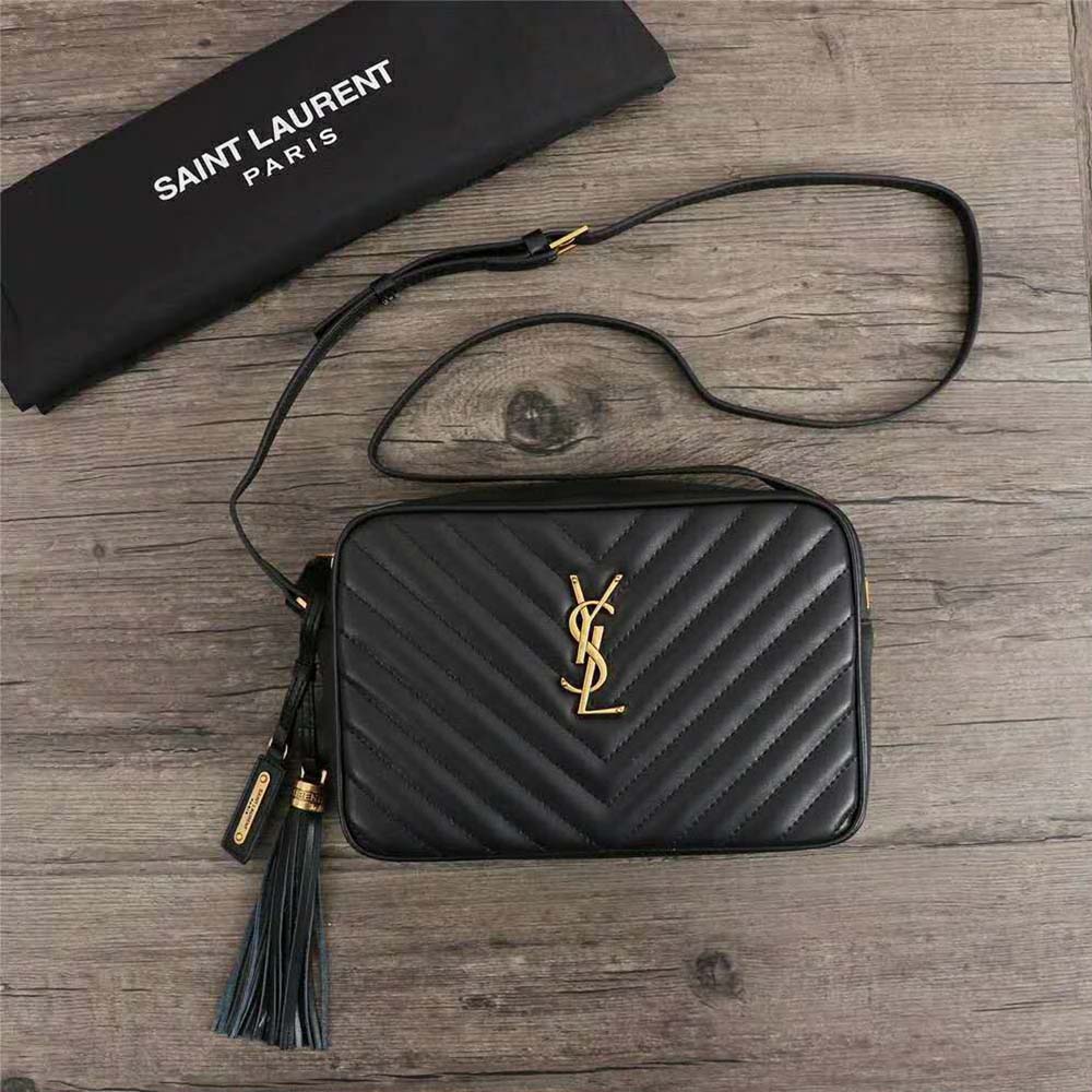 Close-up of signature YSL gold hardware on Lou Camera Bag