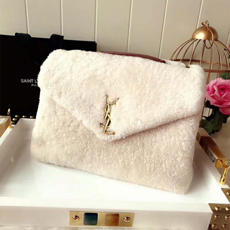 Side angle showing plush shearling texture on Saint Laurent YSL Loulou bag