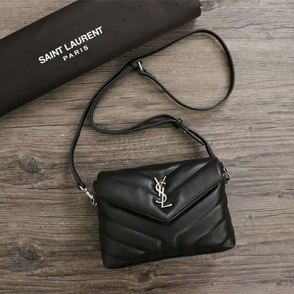 Close-up of gold-tone YSL logo on Saint Laurent YSL Women Loulou Small Matelasse Y Leather-Black