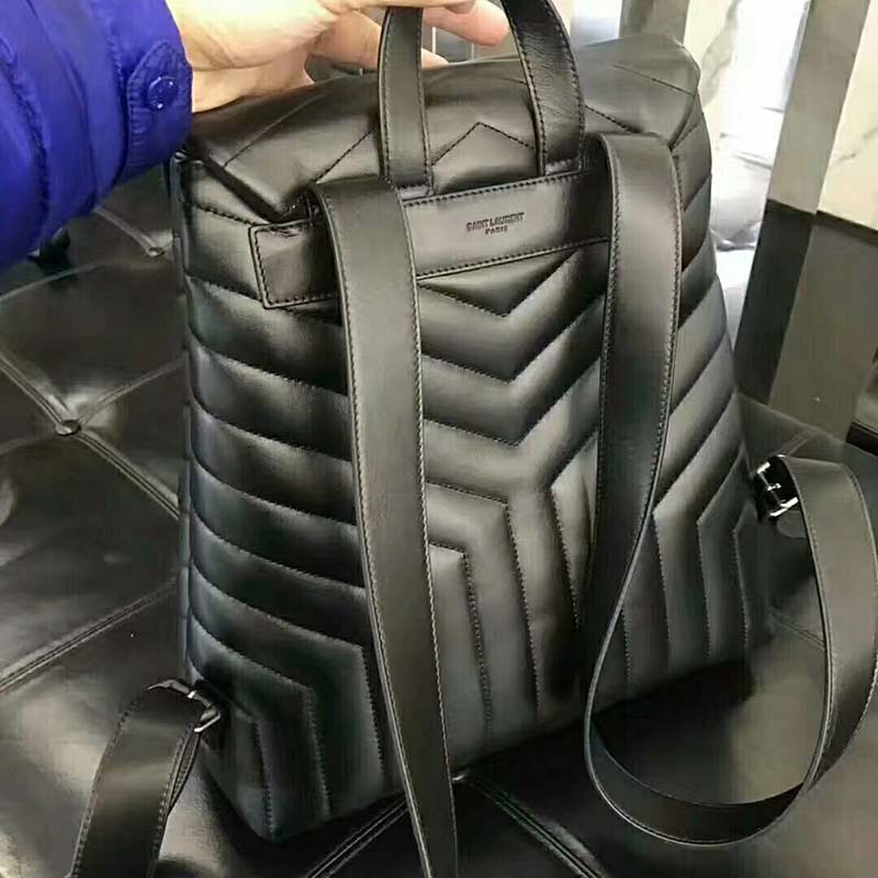 Side profile showing adjustable straps on Saint Laurent YSL backpack