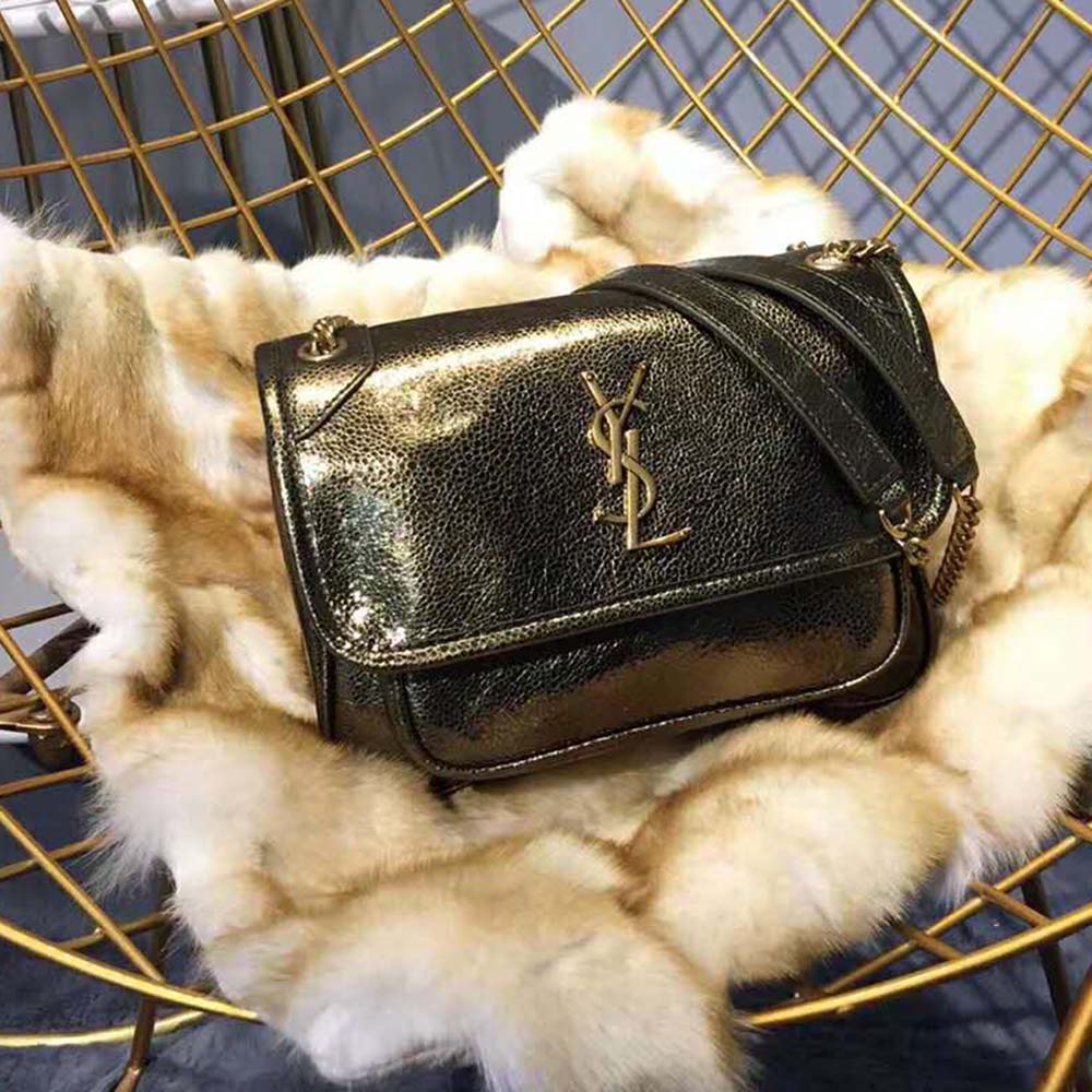 Close-up of YSL monogram clasp on Saint Laurent YSL Women Niki Baby