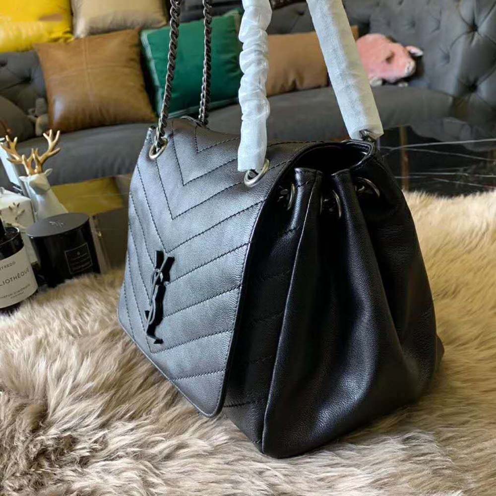 Side angle showing compact shape of Saint Laurent YSL Women Nolita Small Bag