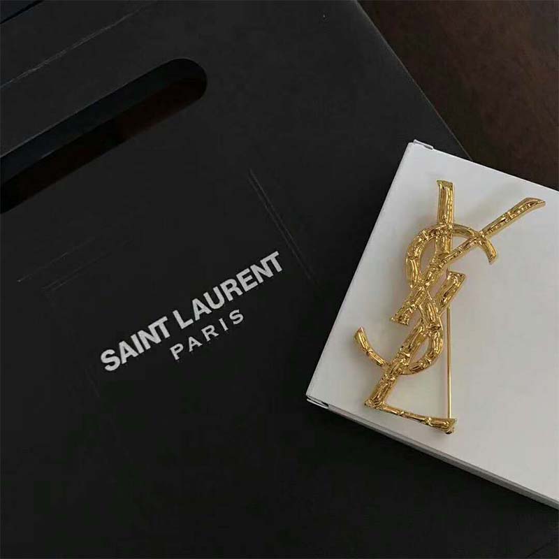 Side angle showing clasp mechanism on Saint Laurent YSL Crocodile Brooch