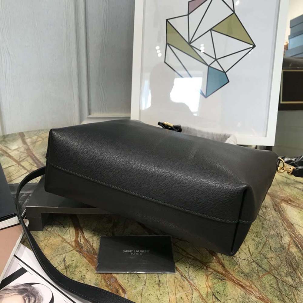 Side profile showing supple leather texture of Saint Laurent Toy Shopping Supple-Black