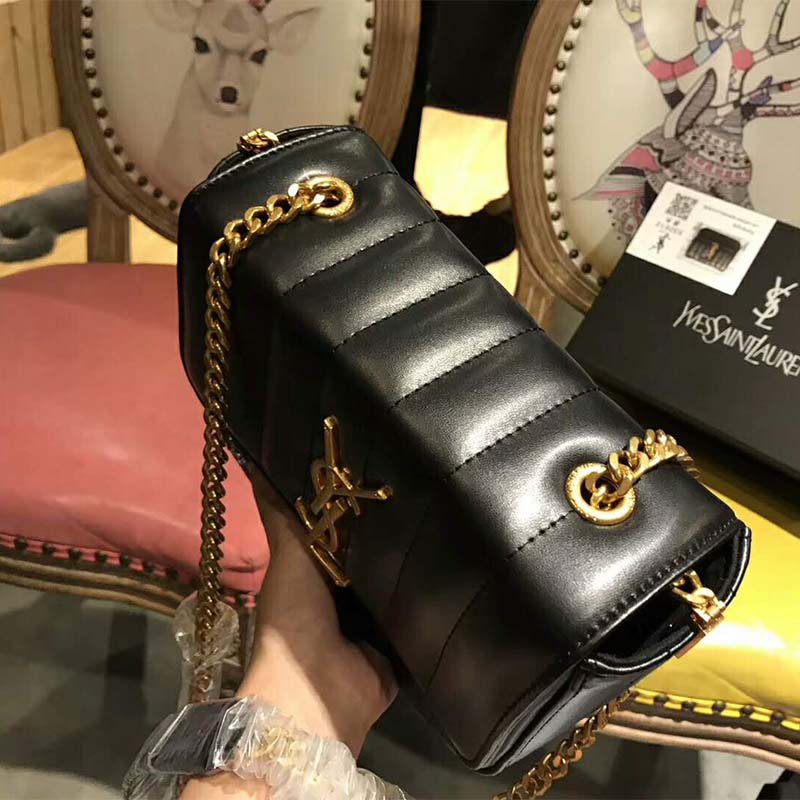 Side angle showing matelassé quilting texture, Saint Laurent YSL bag