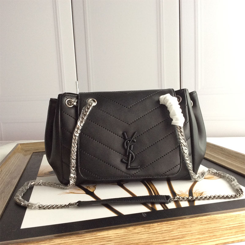 Close-up on gold YSL logo hardware of Small Nolita Bag
