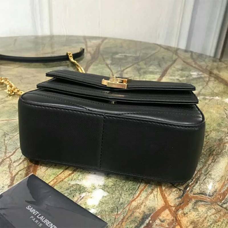 Side angle showing structured silhouette of Saint Laurent YSL Women Sulpice Small bag