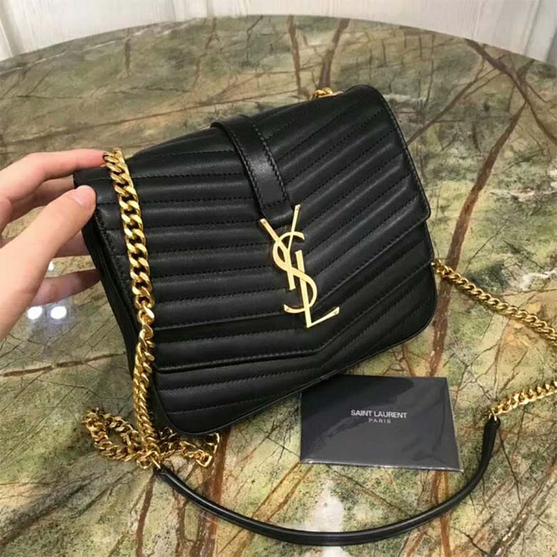 Close-up on gold YSL monogram hardware on Saint Laurent YSL Women Sulpice Small