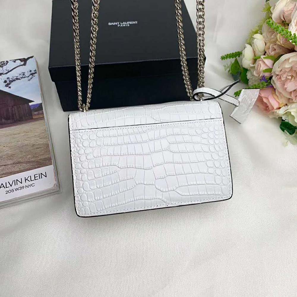 Side angle showing shoulder strap and crocodile texture detail