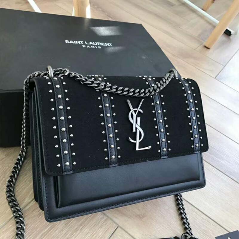 Side angle showing textured suede and leather on Saint Laurent YSL Sunset bag