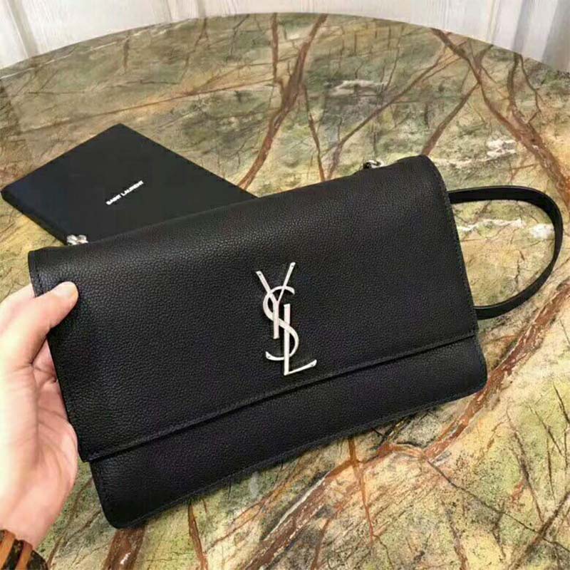 Close-up of gold YSL hardware on Saint Laurent YSL Women Sunset Medium bag